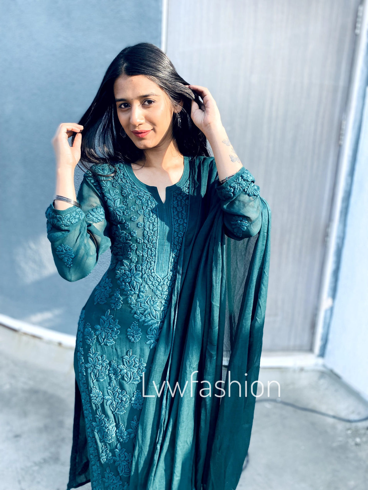 A beautiful premium georgette long kurta with intricate chikankari embroidery and silk slip by LVW Fashion.