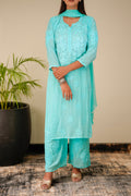 Luxurious LVW Fashion silk Chikankari Kurta set with unique bottom design, featuring intricate embroidery on premium fabric.