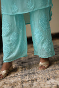 Luxurious LVW Fashion silk Chikankari Kurta set with unique bottom design, featuring intricate embroidery and elegant craftsmanship.