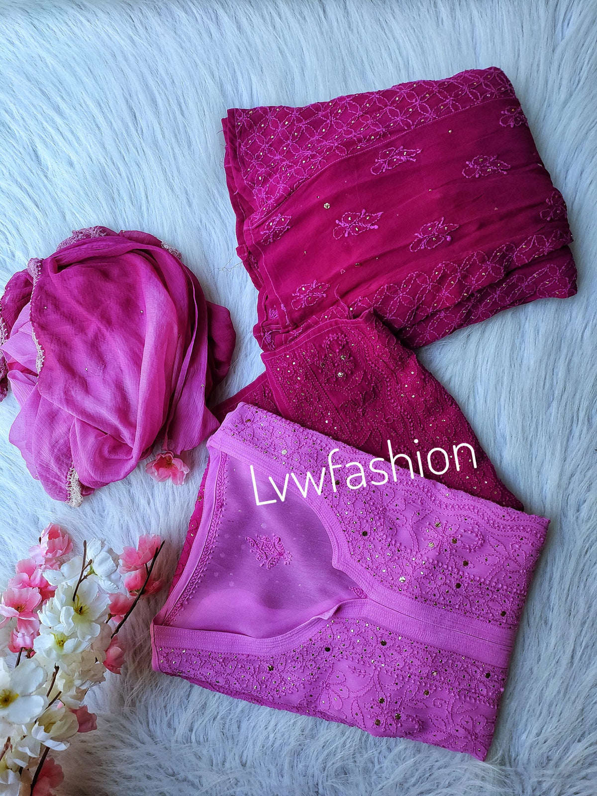 Beautiful rose-colored georgette 3-piece sharara set by LVW Fashion, featuring an ombre shade and intricate chikankari embroidery.