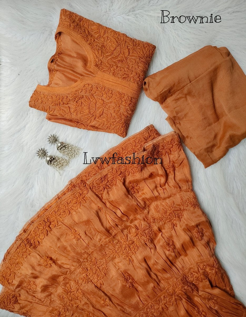 Luxurious Pazeb Premium Muslin Gharara Set by LVW Fashion with intricate Chikankari embroidery, displayed on a plain background.