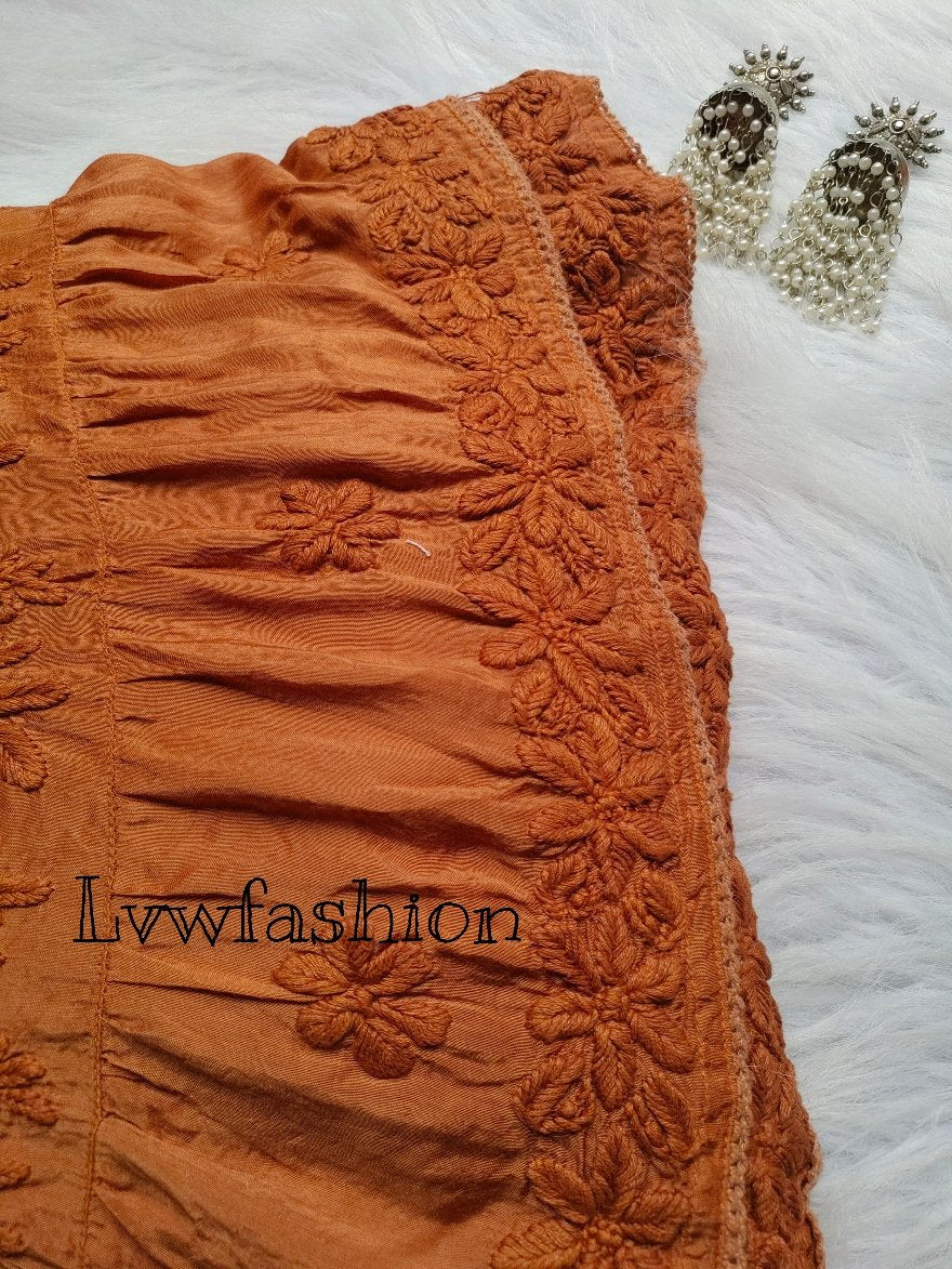 Luxurious Pazeb Premium Muslin Gharara Set by LVW Fashion with intricate Chikankari embroidery in a vibrant traditional design.