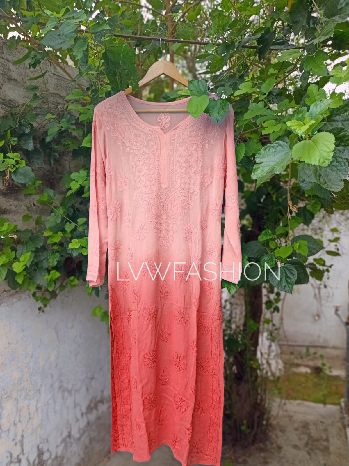 Beautiful peach long kurta by LVW Fashion with premium georgette, Resham thread embroidery, and matching slip, showcasing intricate Chikankari.