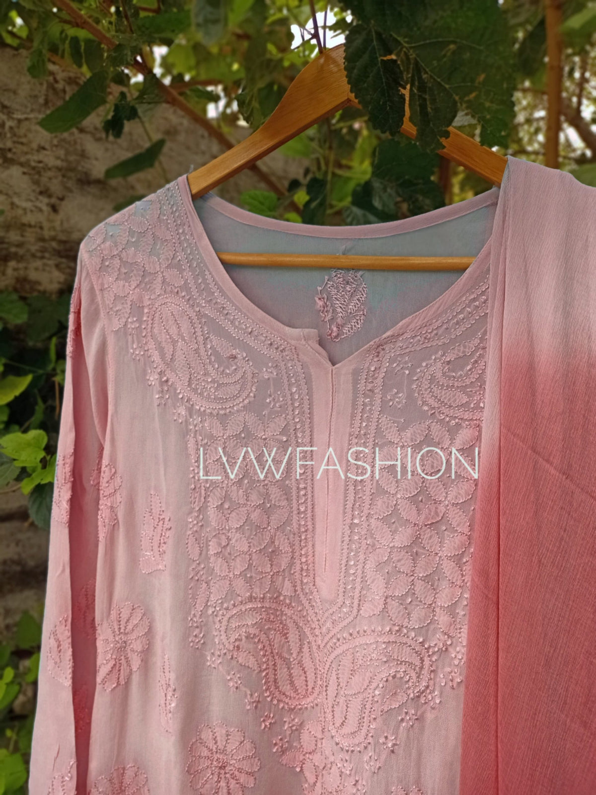 Beautiful peach long kurta with resham thread embroidery and slip, made from premium georgette fabric by LVW Fashion Luxurious Chikankari.