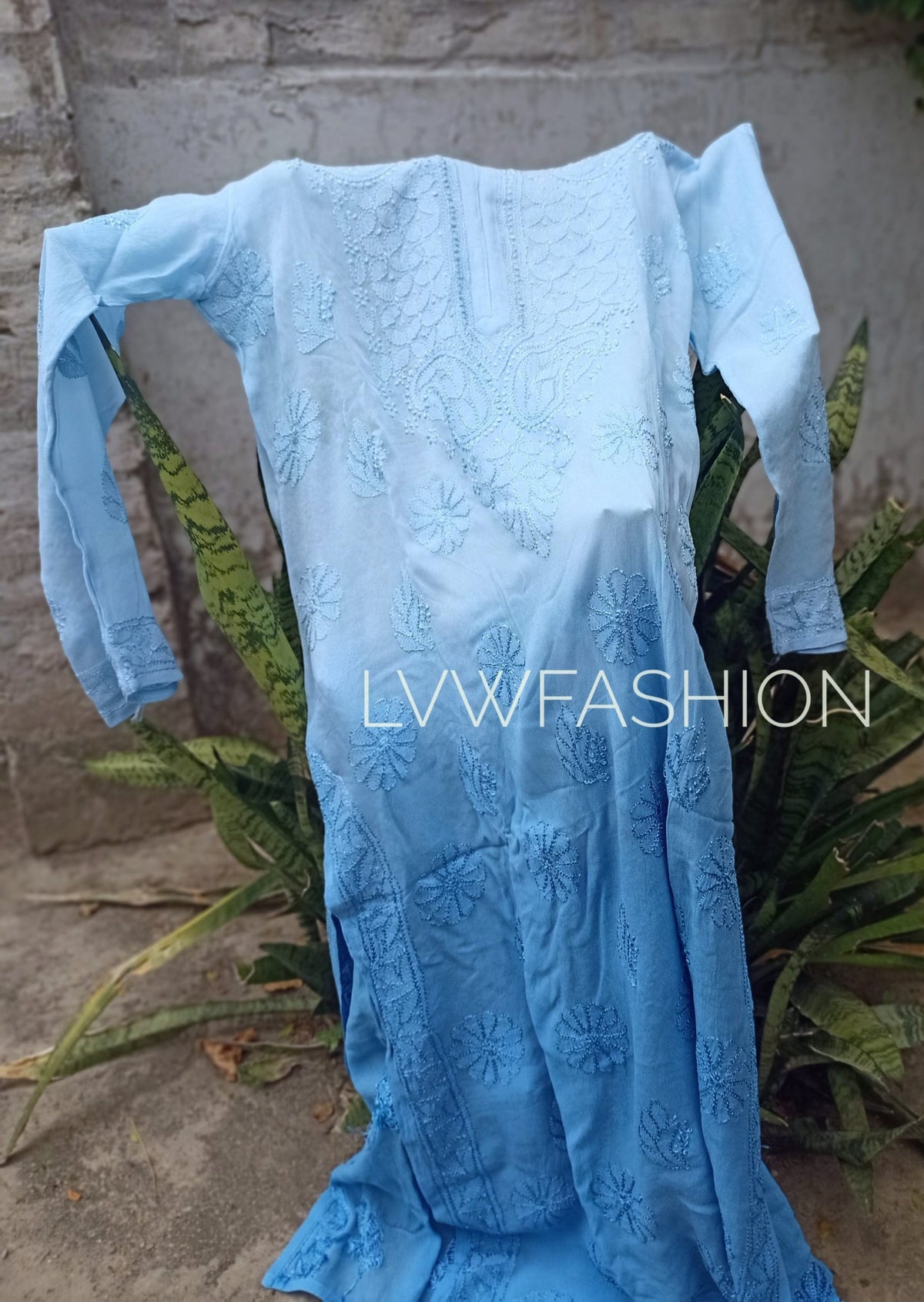 Beautiful peach long kurta with Resham thread embroidery, premium georgette fabric, and matching slip from LVW Fashion Luxurious Chikankari.