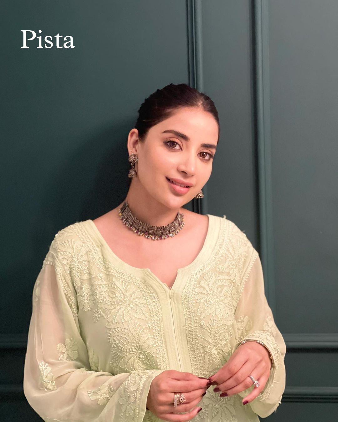 Beautiful premium pistachio georgette short kurti with intricate chikankari embroidery and matching inner, by LVW Fashion.