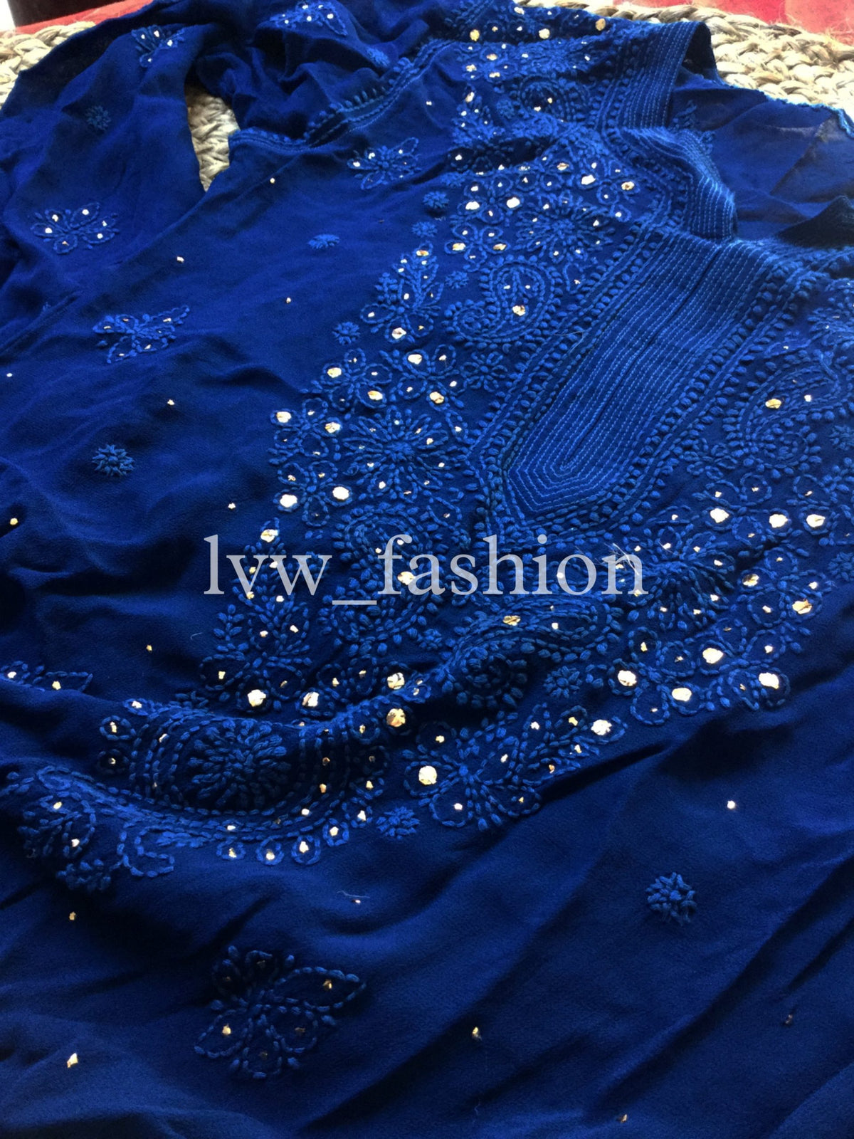 Blue and white kurta set by LVW Fashion Luxurious Chikankari, featuring intricate design and elegant traditional style.