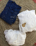 Blue and white kurta set by LVW Fashion with intricate Chikankari embroidery, featuring a luxurious traditional design.