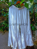 Premium pink and white georgette 3-piece set by LVW Fashion Luxurious Chikankari, featuring intricate detailing and elegant fabric.