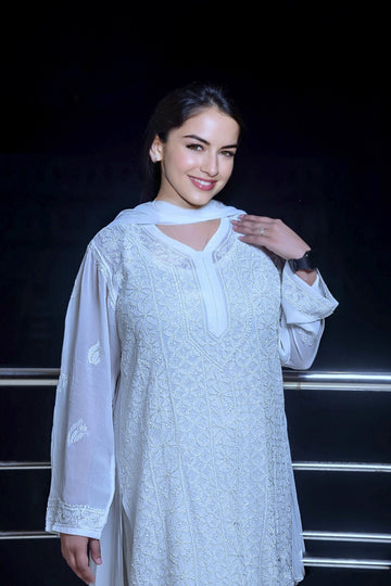 White georgette Chikankari kurti and sharara set by LVW Fashion, featuring intricate embroidery and luxurious fabric.