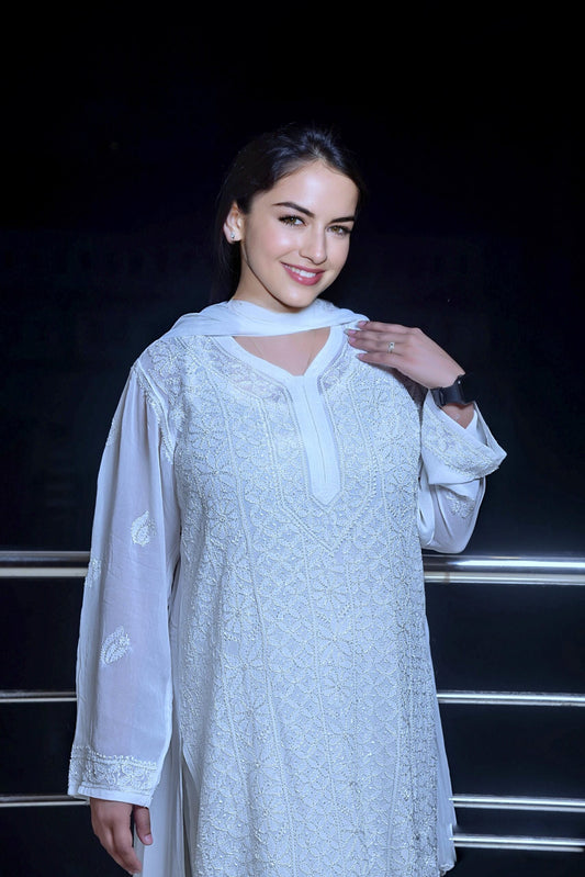 White georgette Chikankari kurti and sharara set by LVW Fashion, featuring intricate embroidery and luxurious fabric.