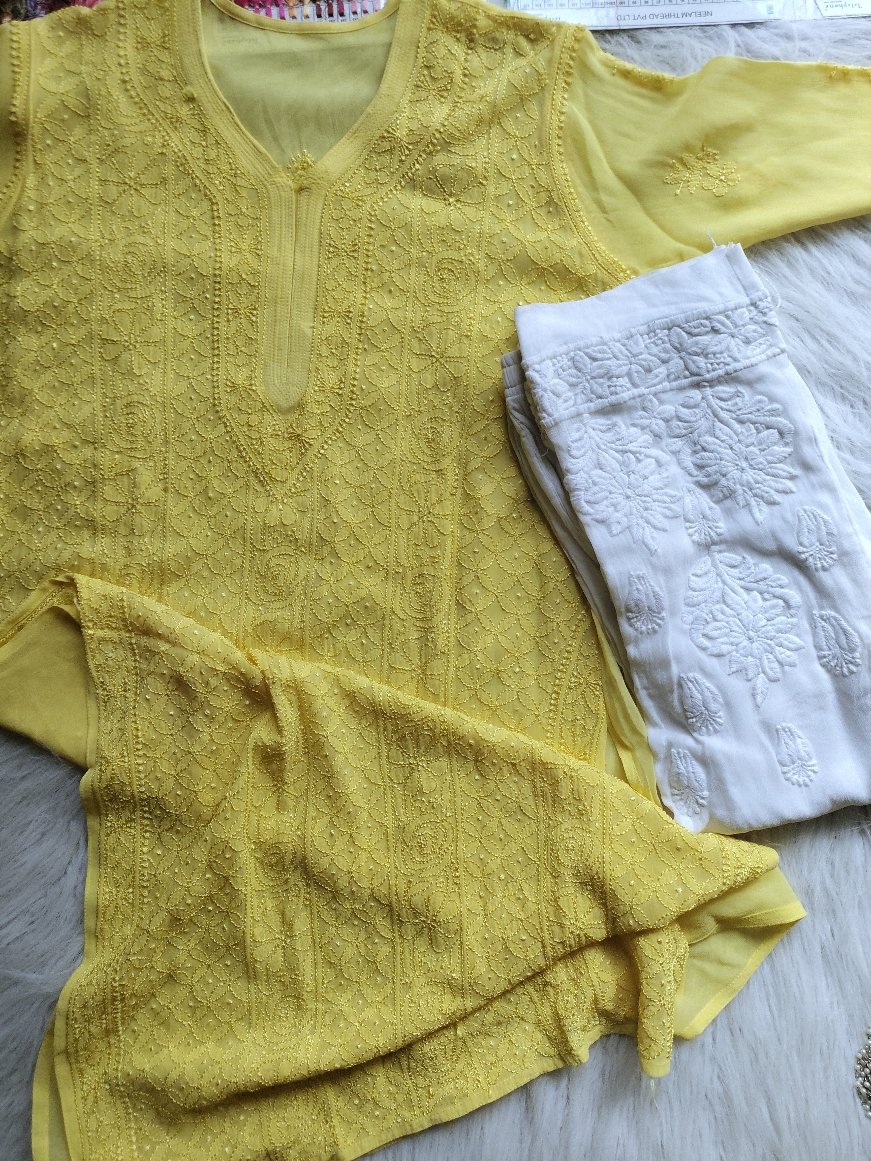 Luxurious LVW Fashion Pure Chikankari suits combo showcasing intricate embroidery and elegant traditional design.