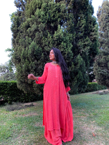 LVW Fashion Luxurious Chikankari Gharara Kamdani Kurta Set with intricate embroidery, four-piece design, worn by a model in vibrant Rani color.
