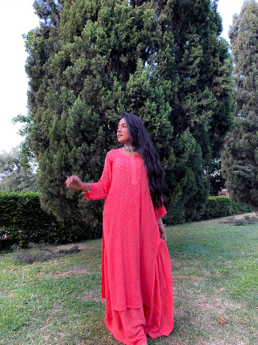 LVW Fashion Luxurious Chikankari Gharara Kamdani Kurta Set with intricate embroidery, four-piece design, worn by a model in vibrant Rani color.