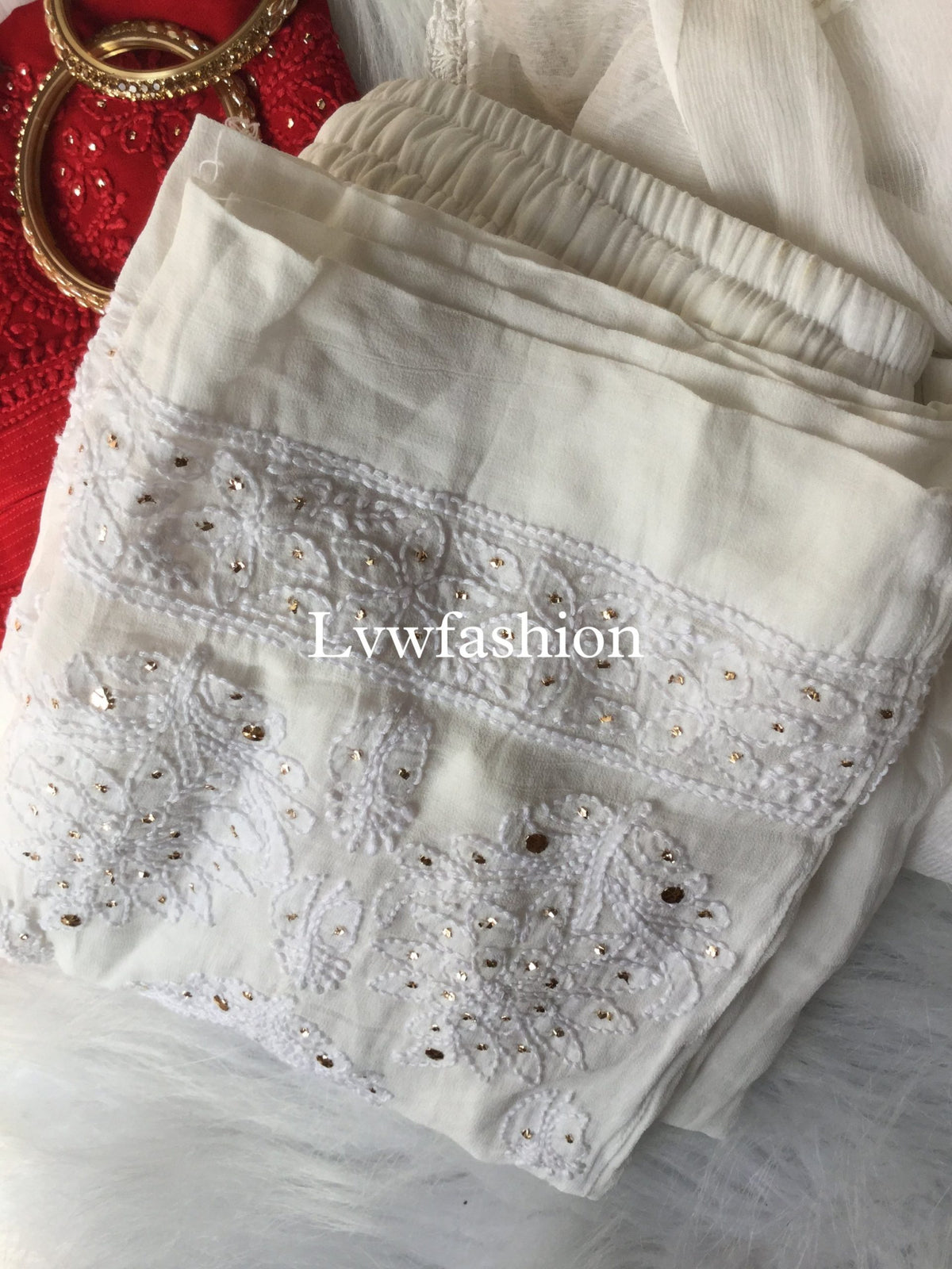 Red and white premium georgette 3-piece set with inner by LVW Fashion Luxurious Chikankari, featuring elegant fabric and intricate details.