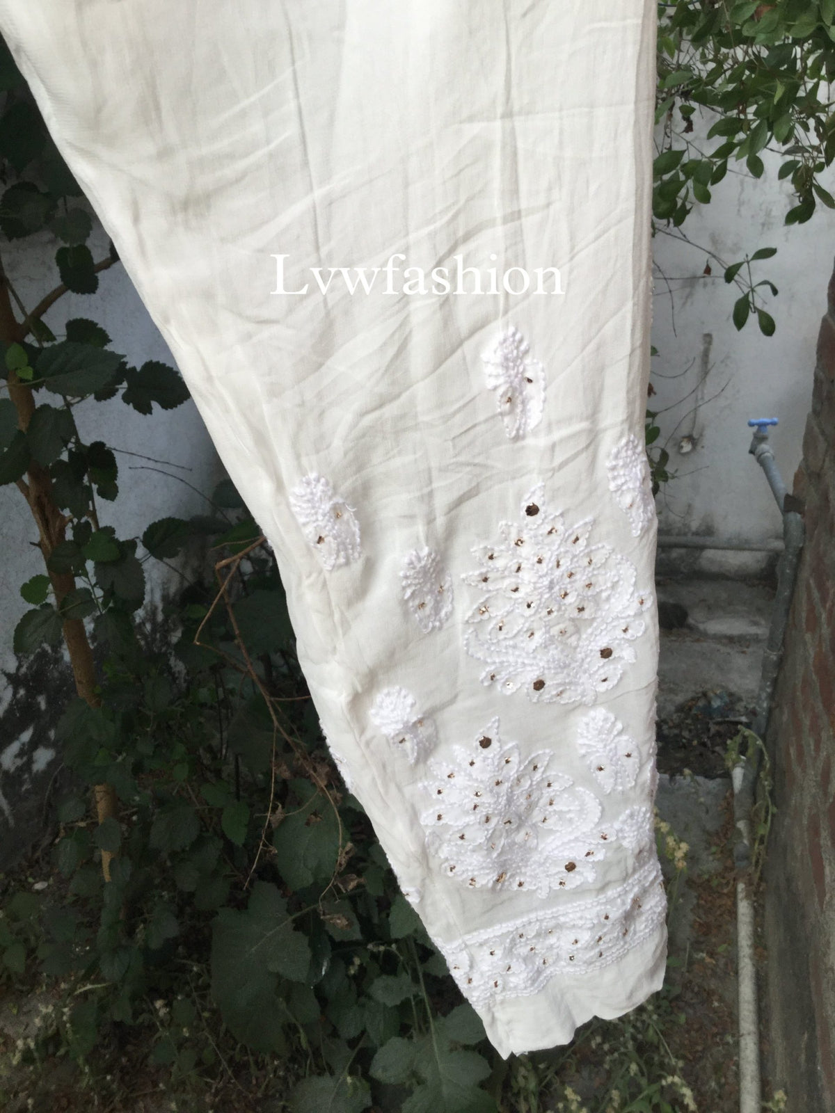 Red and white premium georgette 3-piece set with inner by LVW Fashion Luxurious Chikankari, featuring elegant fabric and intricate details.