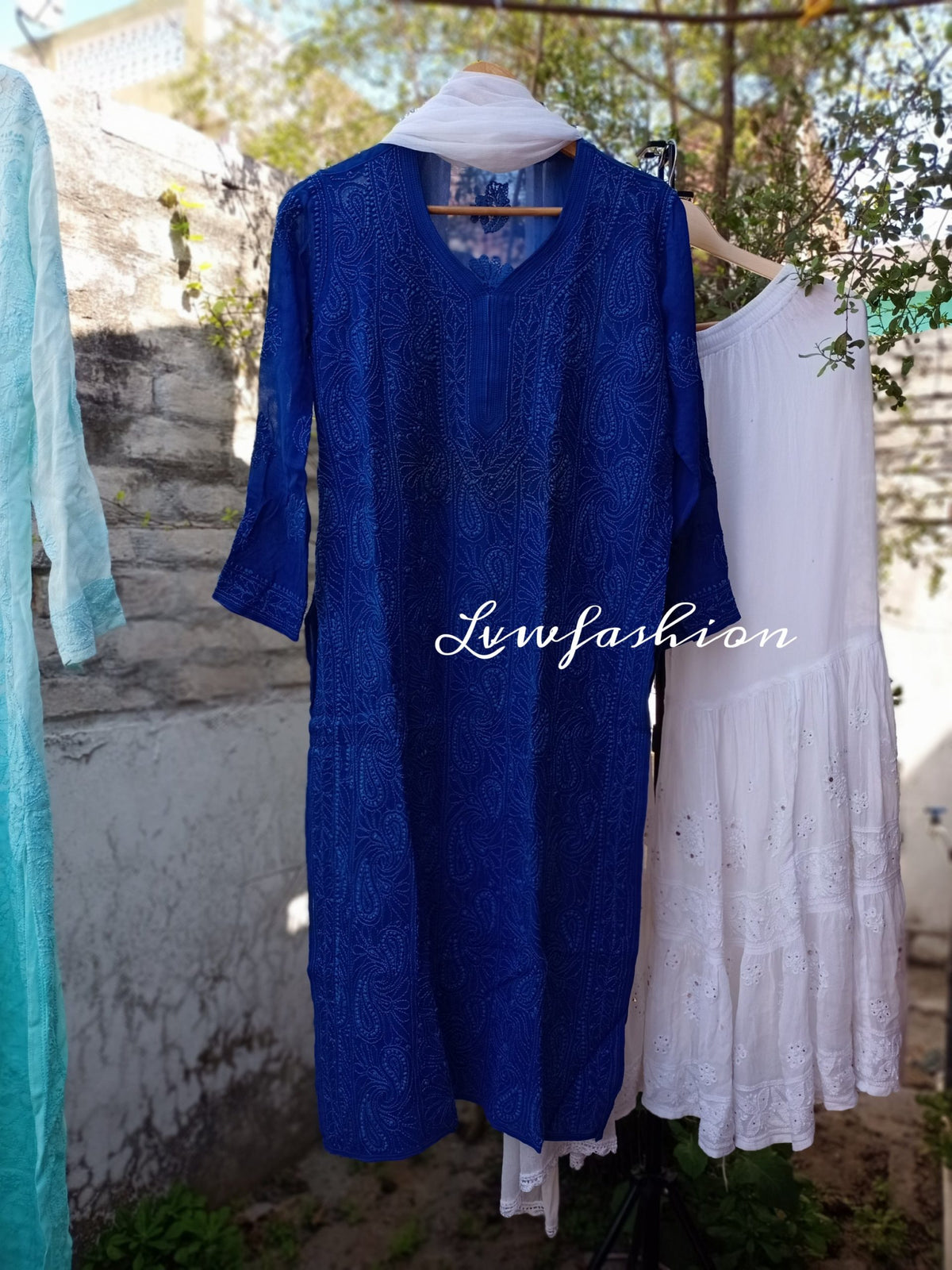 Midnight blue and white Resham thread Gharara set in premium georgette with intricate Chikankari embroidery by LVW Fashion.