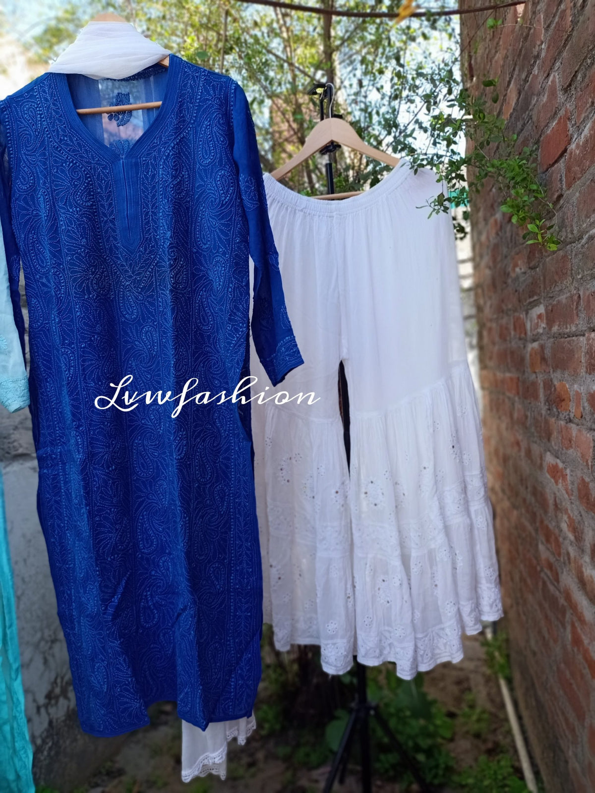 Midnight blue and white Resham thread Gharara set in premium georgette with intricate Chikankari embroidery, by LVW Fashion Luxurious.