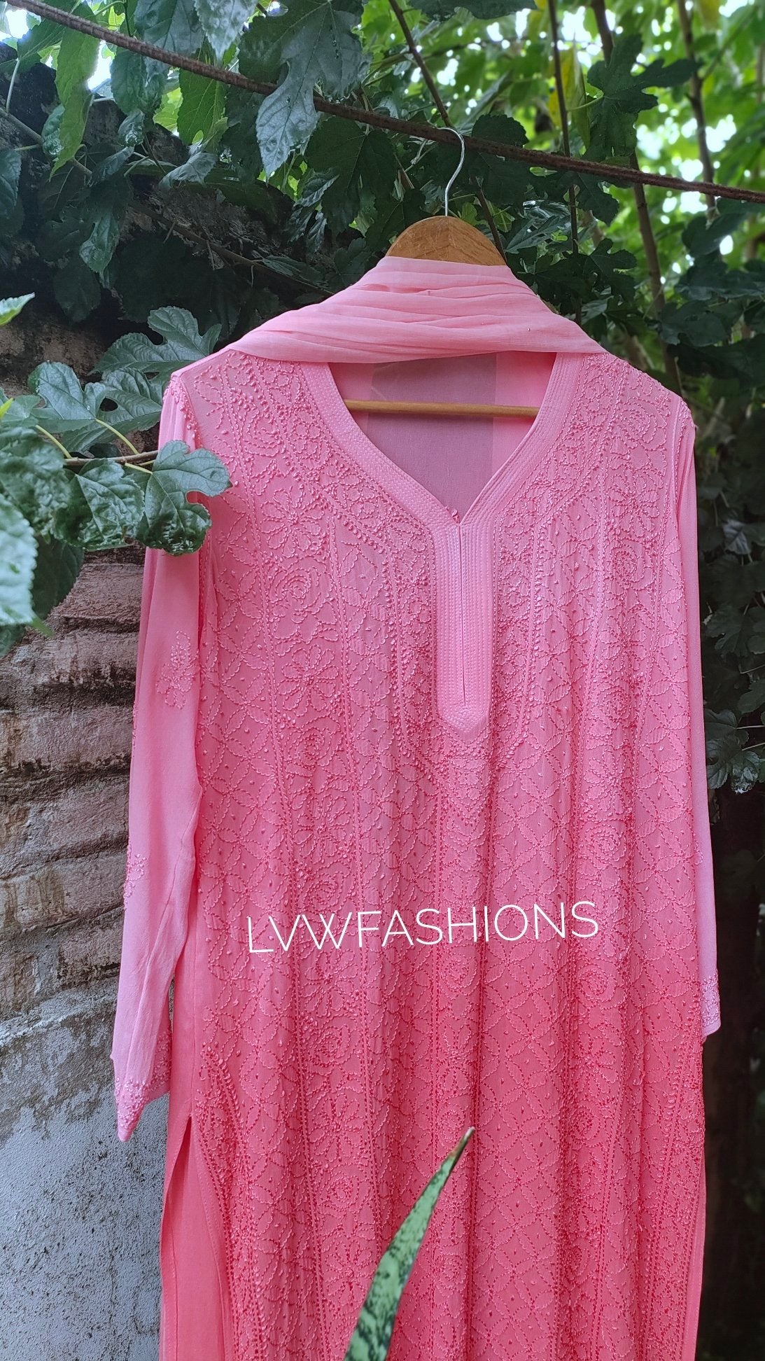 Peach Sukoon premium georgette kurta set with intricate handmade chikankari embroidery, featuring a traditional and elegant design.