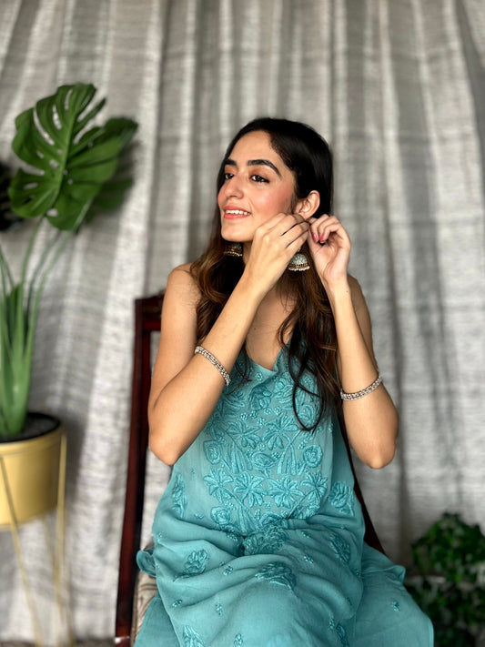 Turquoise Tulip Plazzos Straps set by LVW Fashion Luxurious Chikankari, featuring stylish pants with strap details.
