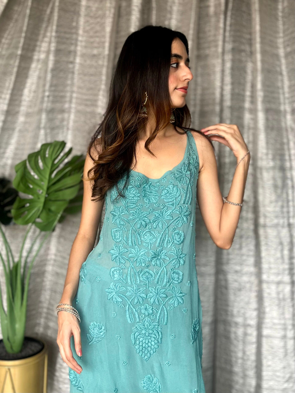 Turquoise Tulip Plazzos with straps from LVW Fashion Luxurious Chikankari set, featuring intricate embroidery and comfortable fit.
