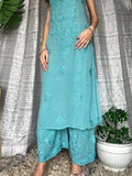Turquoise Tulip Plazzos Straps set by LVW Fashion Luxurious Chikankari, featuring stylish turquoise pants with straps and intricate detailing.