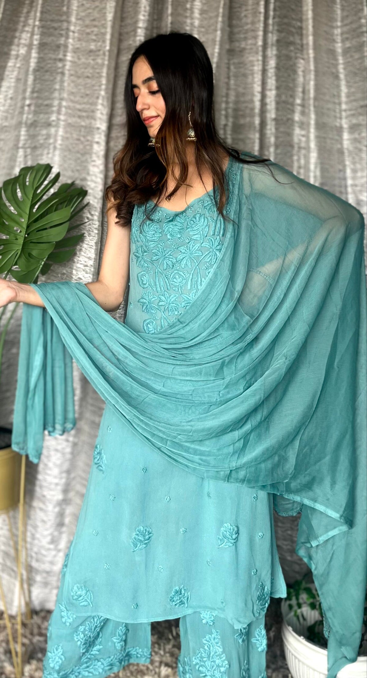 Turquoise Tulip Plazzos with straps from LVW Fashion Luxurious Chikankari, featuring intricate embroidery and lightweight fabric.