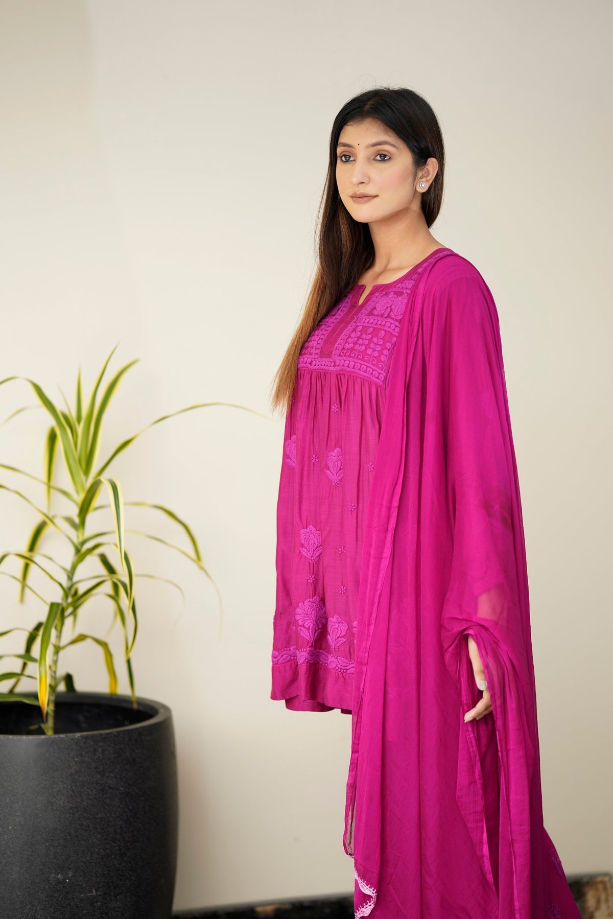Luxurious Tulip Tunic and Plazzos set in premium muslin silk by LVW Fashion with elegant Chikankari embroidery.