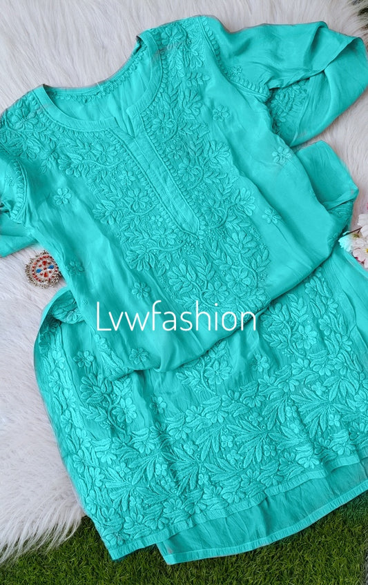 Viridian green crepe silk long kurta with chikankari embroidery and matching slip from LVW Fashion.