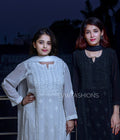 White and black premium georgette Chikankari kurta set by LVW Fashion, featuring intricate embroidery and a traditional design.