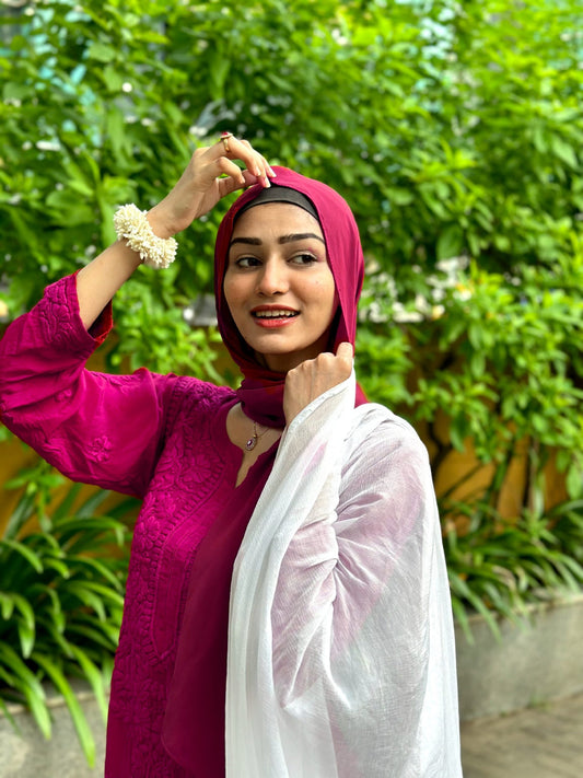 White Sariya Tyrian premium muslin silk kurta set with intricate Chikankari embroidery from LVW Fashion Luxurious Chikankari.