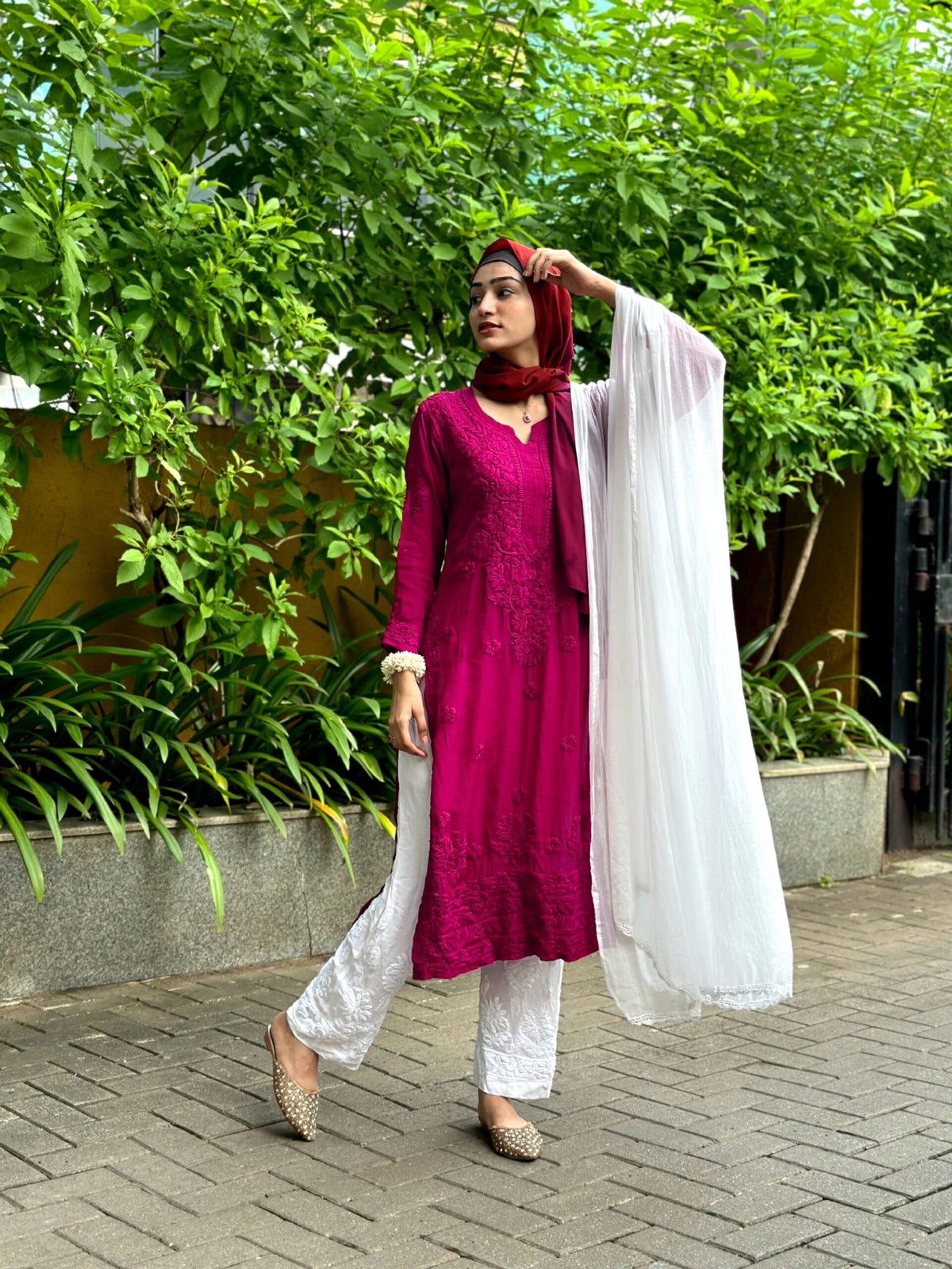 White Sariya Tyrian premium muslin silk Chikankari Kurta set by LVW Fashion, showcasing intricate embroidery and traditional design.