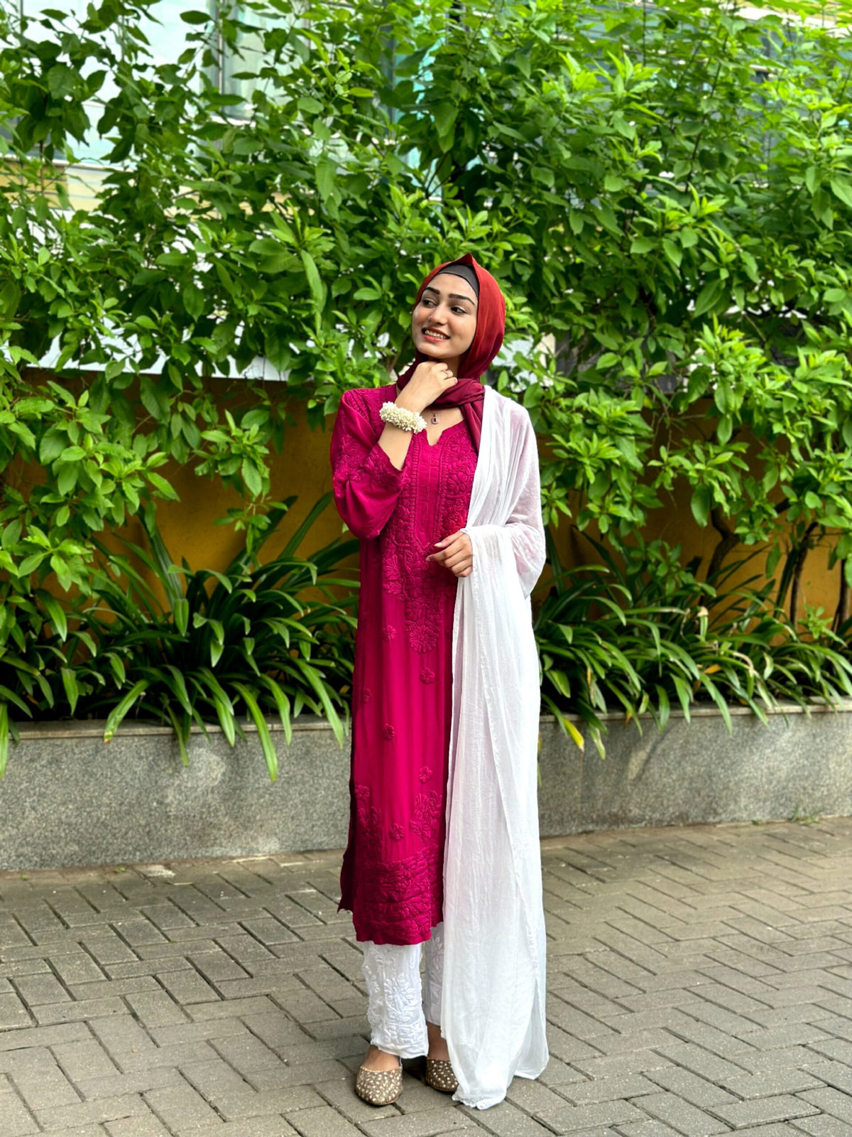White Sariya Tyrian premium muslin silk Chikankari Kurta set by LVW Fashion with intricate embroidery and traditional design details.