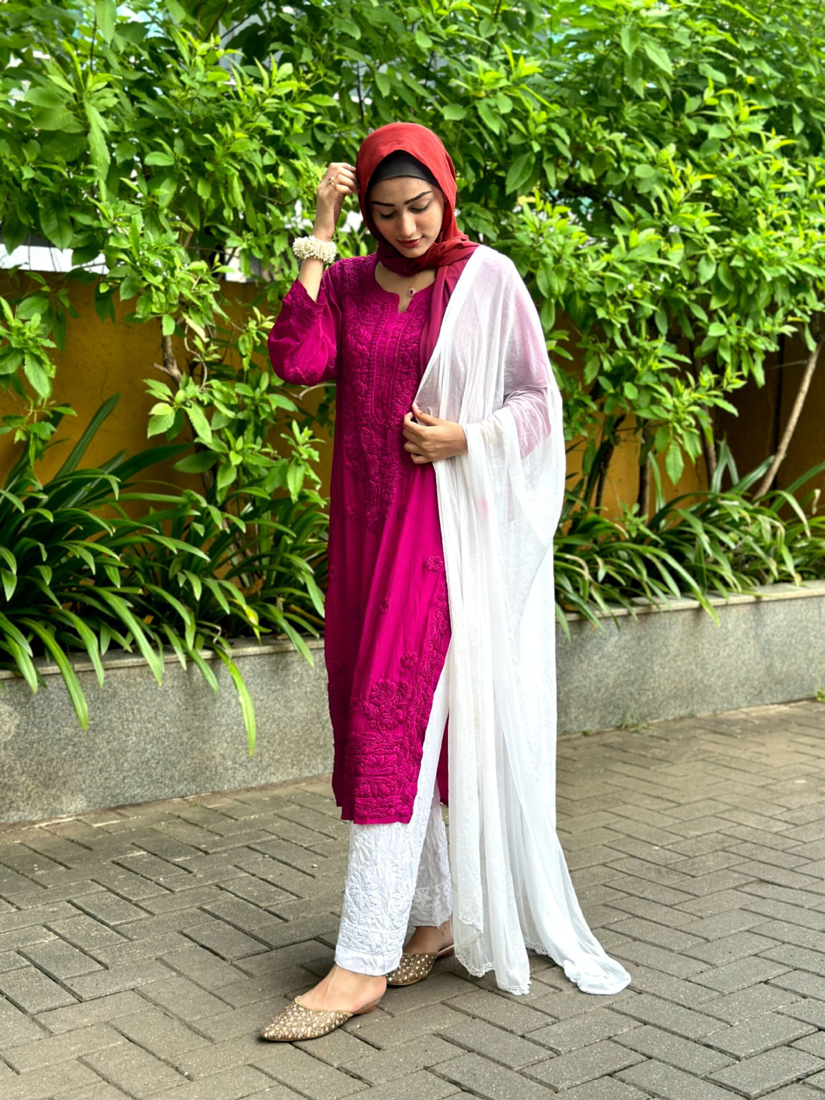 White Sariya Tyrian premium muslin silk Chikankari Kurta set by LVW Fashion, featuring intricate embroidery and traditional craftsmanship.