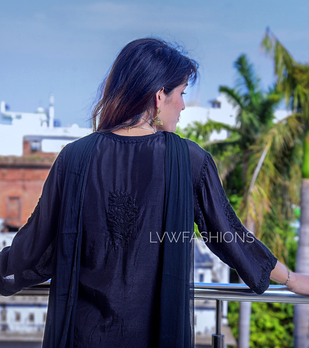 White U&K Premium Muslin Silk Gharara Chikankari Set by LVW Fashion featuring intricate embroidery and traditional design.