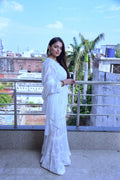 Luxurious white U&K Premium Muslin Silk Gharara Chikankari Set by LVW Fashion, featuring intricate embroidery and traditional design.