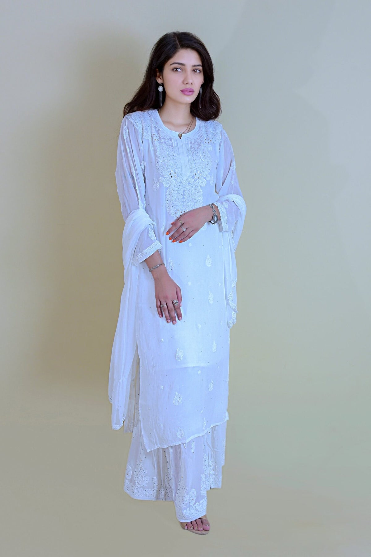 U&K Sober premium black and white georgette Chikankari Gharara set by LVW Fashion, featuring intricate embroidery and traditional design.