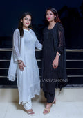 White and black U&K Chikankari premium georgette kurta set by LVW Fashion, featuring intricate embroidery and traditional design.