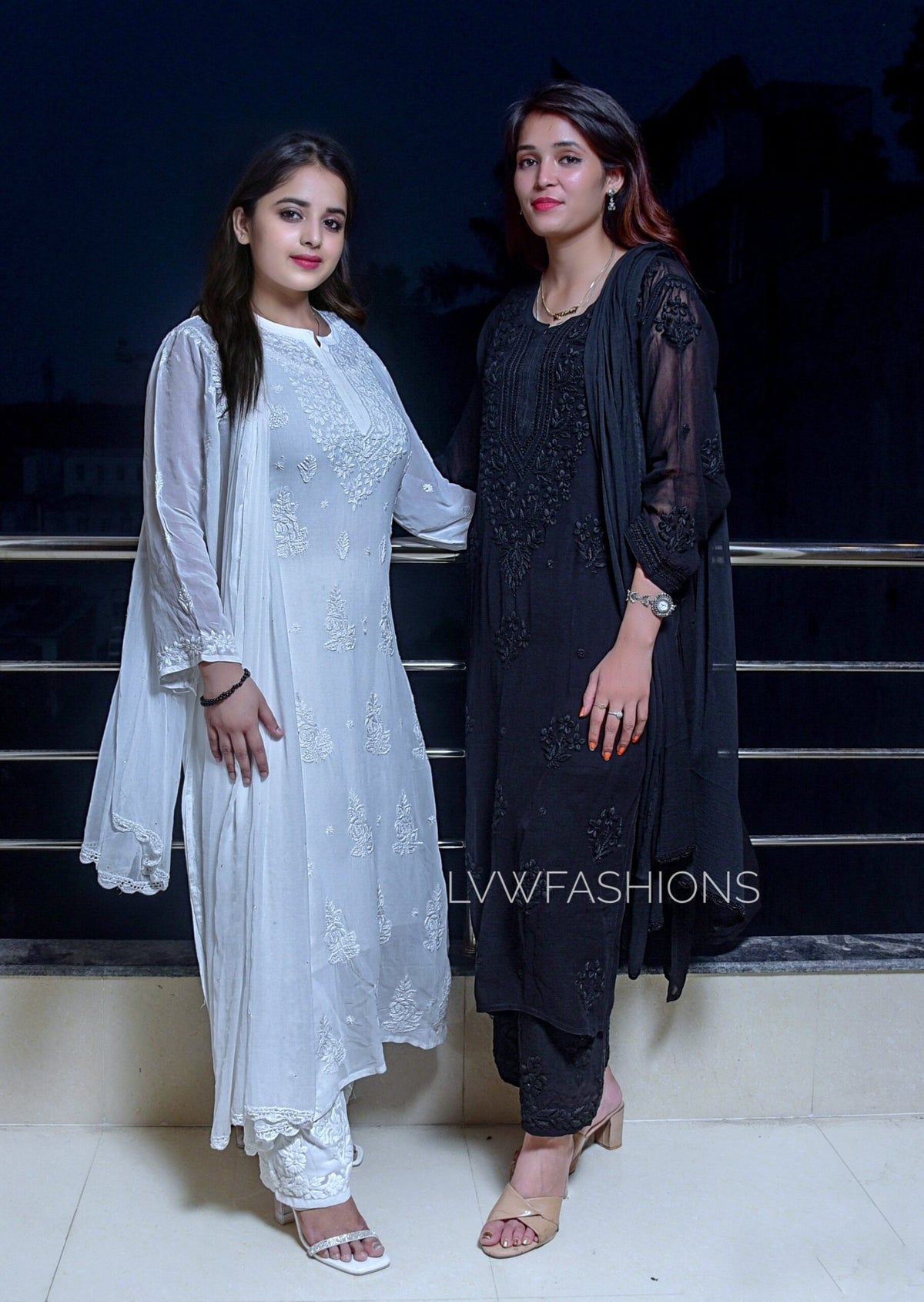 White and black U&K Chikankari premium georgette kurta set by LVW Fashion, featuring intricate embroidery and traditional design.