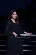 White and black U&K Chikankari kurta set in premium georgette, designed by LVW Fashion with intricate hand embroidery.
