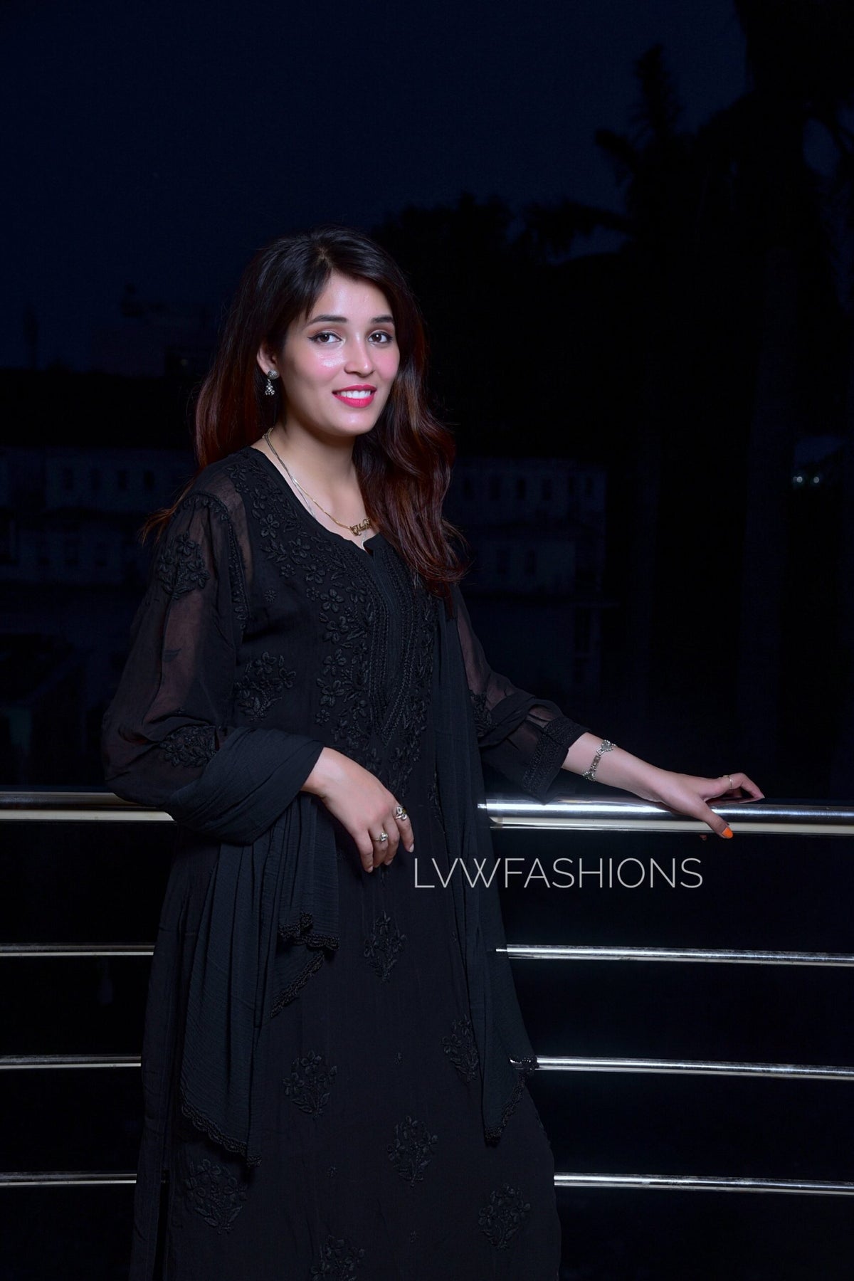 White and black U&K Chikankari kurta set in premium georgette, designed by LVW Fashion with intricate hand embroidery.