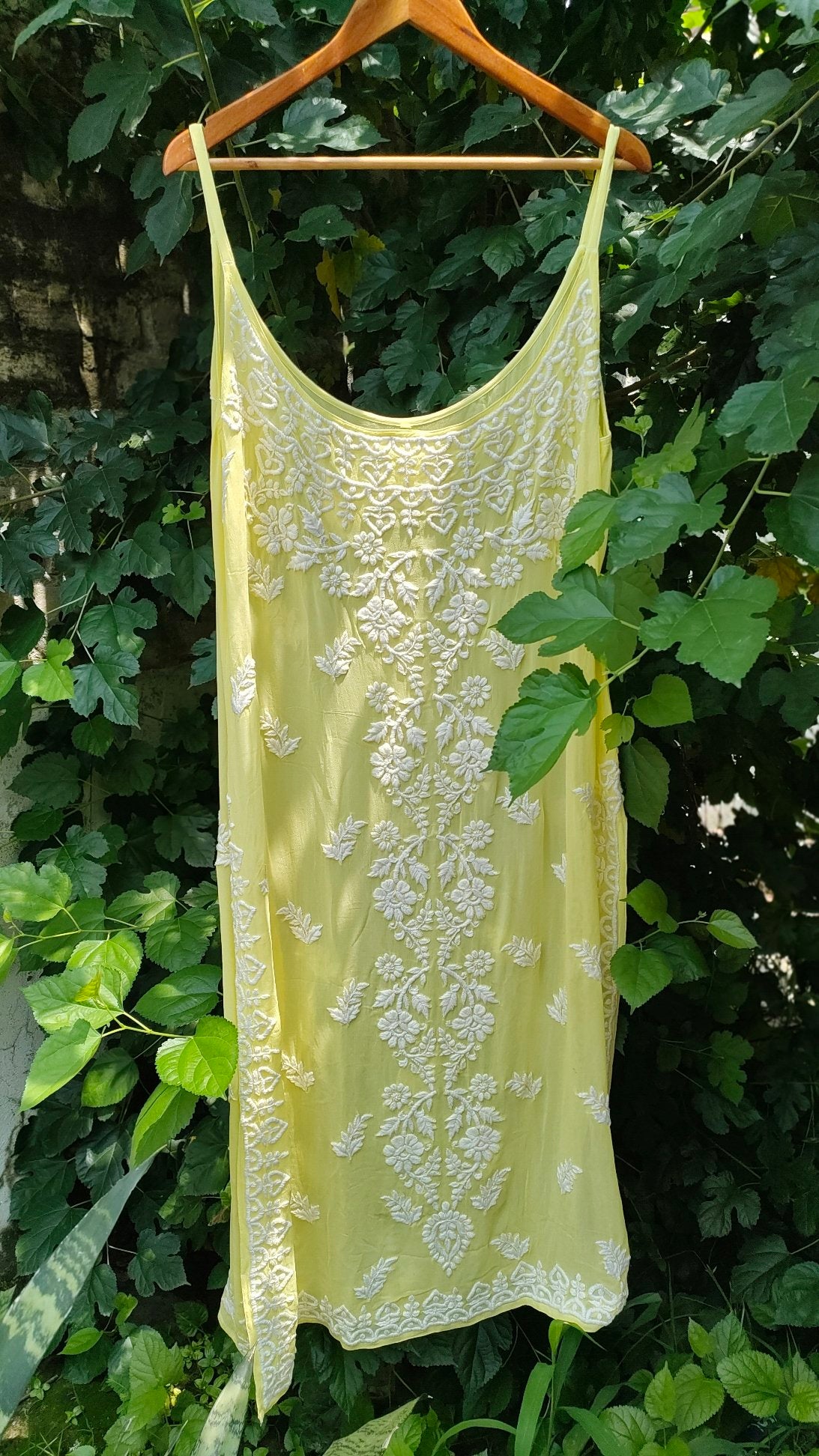 Pink tulip sleeveless long kurta with intricate Chikankari embroidery and matching bottom dupatta in premium georgette fabric.
