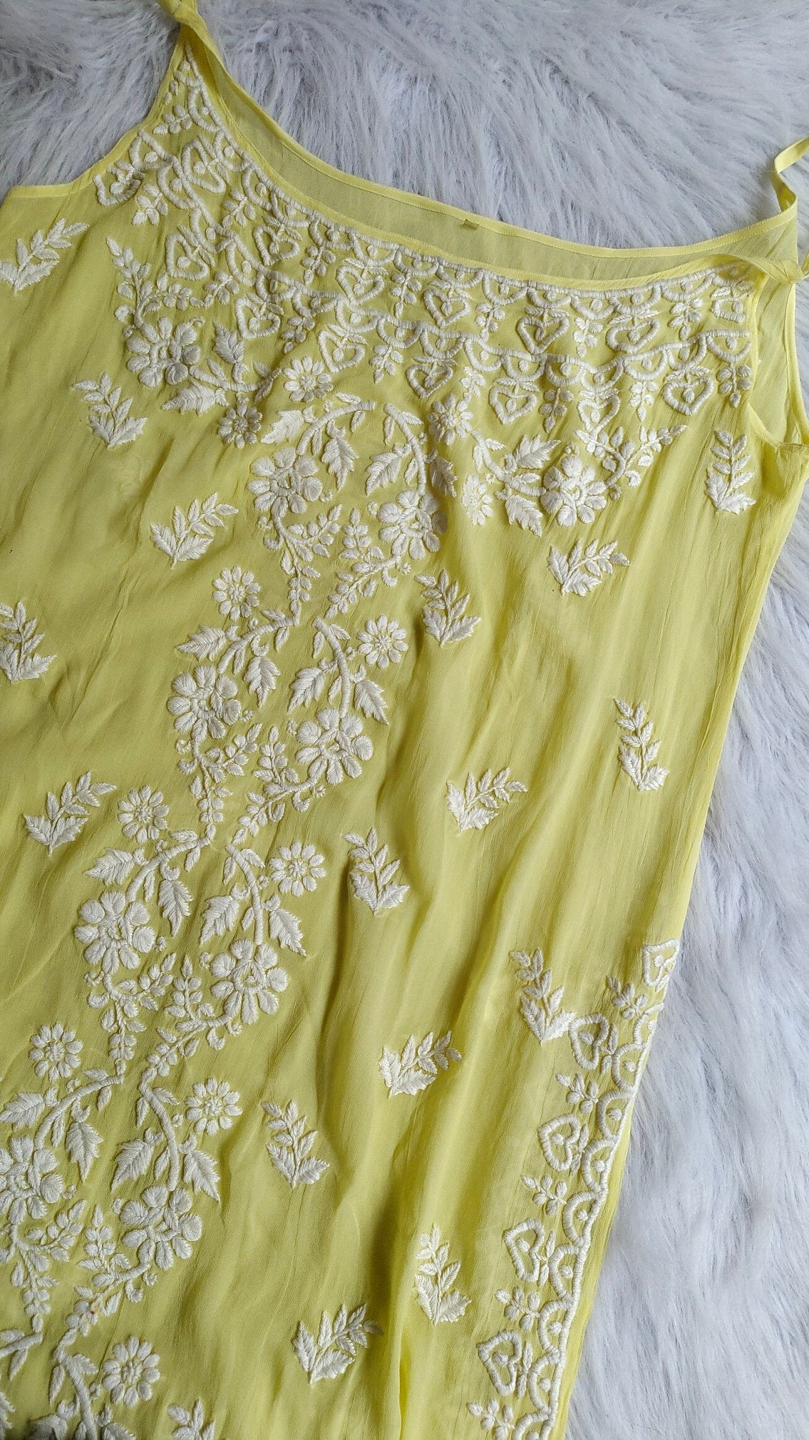 Pink Tulip sleeveless georgette long Chikankari kurta with intricate embroidery and matching dupatta by LVW Fashion Luxurious.
