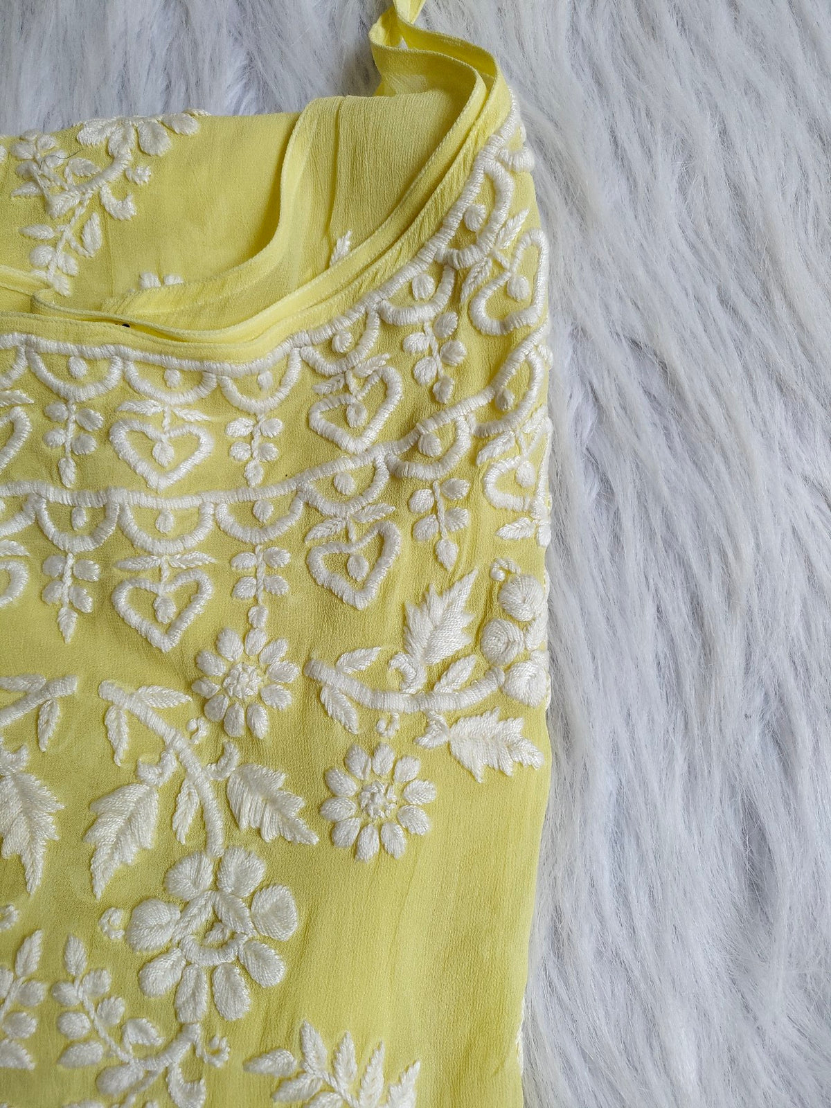 Pink Tulip sleeveless premium georgette long Chikankari kurta with intricate embroidery and matching dupatta by LVW Fashion Luxurious Chikankari.