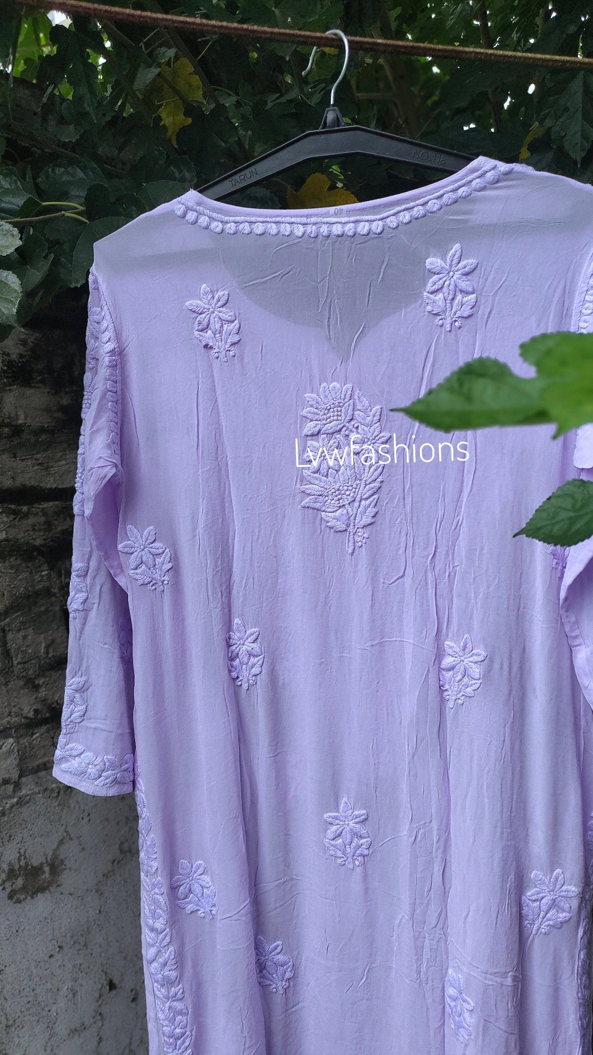 Lavender Sukoon Powder georgette kurta with intricate chikankari embroidery, paired with matching pants and dupatta by LVW Fashion.