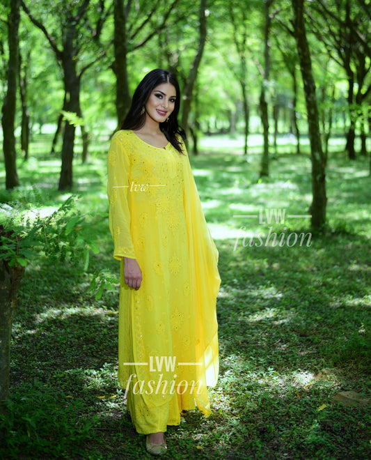 Yellow Resham embroidery long Chikankari kurta with silk slip by LVW Fashion Luxurious Chikankari, showcasing intricate hand embroidery.