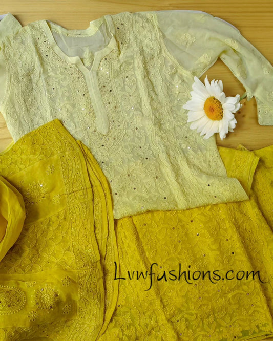 Zena yellow premium georgette Chikankari sharara set by LVW Fashion, featuring intricate embroidery and flowing fabric.