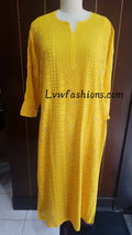 Yellow luxury georgette kurta with intricate chikankari embroidery from LVW Fashion, shown with matching slip, traditional Indian style.